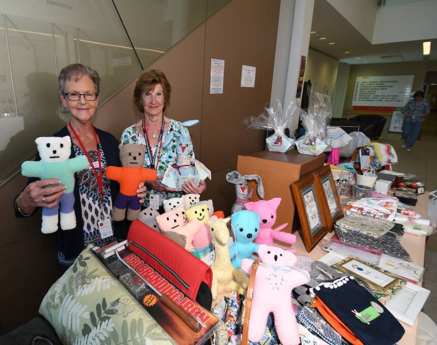SNAPSHOT: Bathurst Hospital Auxiliary members Lynn Holloway and Joan Love are getting ready for the fete this Saturday. Photo: CHRIS SEABROOK