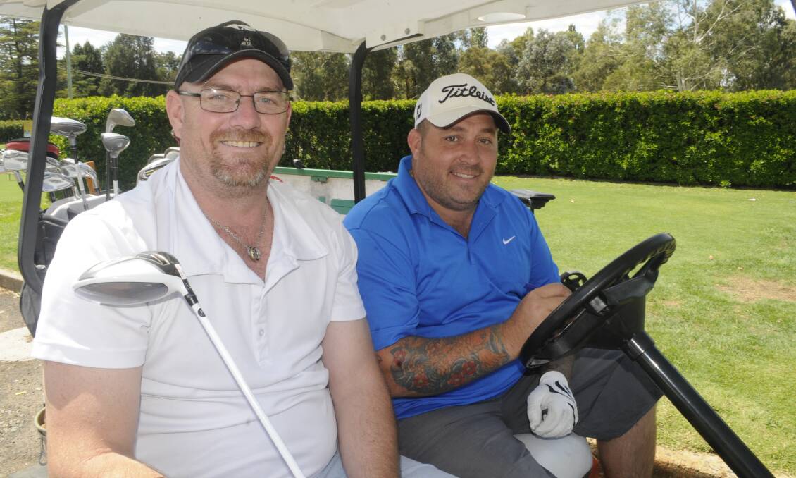 ON COURSE: Mick Bennett and Shannon Ryan at the charity golf day. Photos: CHRIS SEABROOK 022617clegacy1
