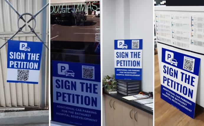 The hospital car parking petition signs are in various businesses around town. Pictures supplied.