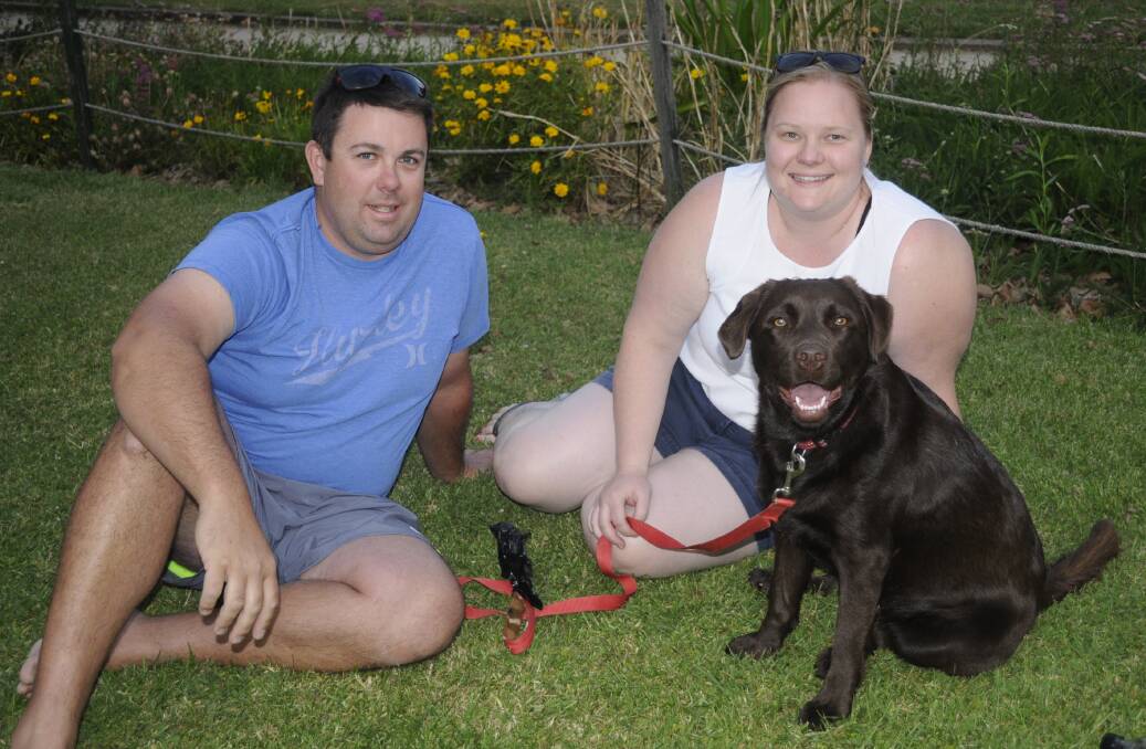 OUT AND ABOUT: Damien and Catherine Humphries with their labrador Georgie. 010717cmpark1