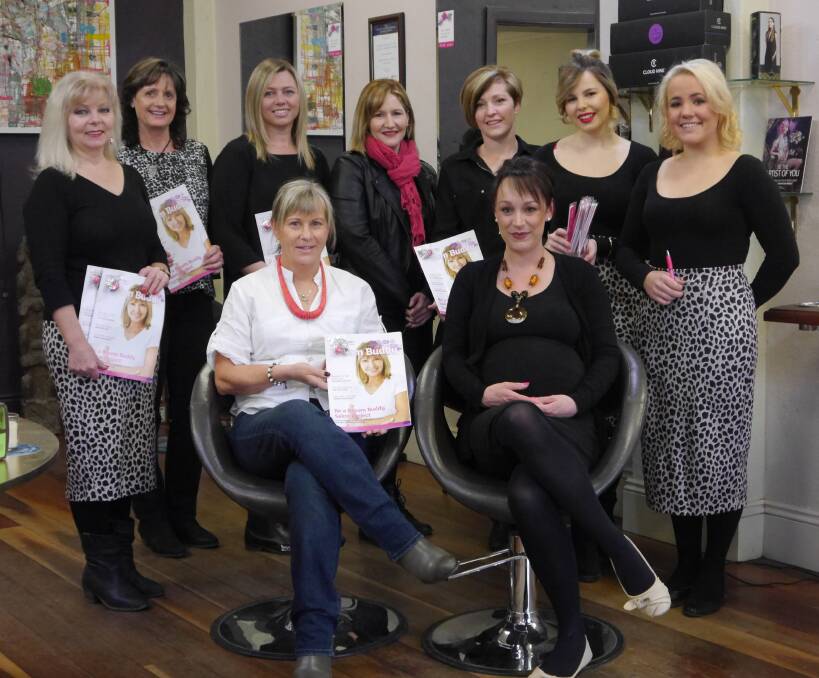 HERE TO HELP: Breast cancer survivor Sue Purvis-Masters (front, left) with Bathurst hairdressers involved in the BreastScreen NSW program.