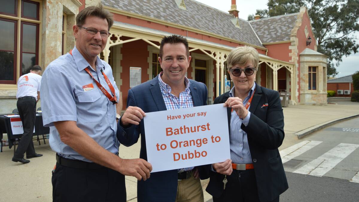 SIGN OF THE TIMES: Member for Bathurst Paul Toole (centre) with Phil Baker and Janelle Bestwick from Bathurst Railway Station.