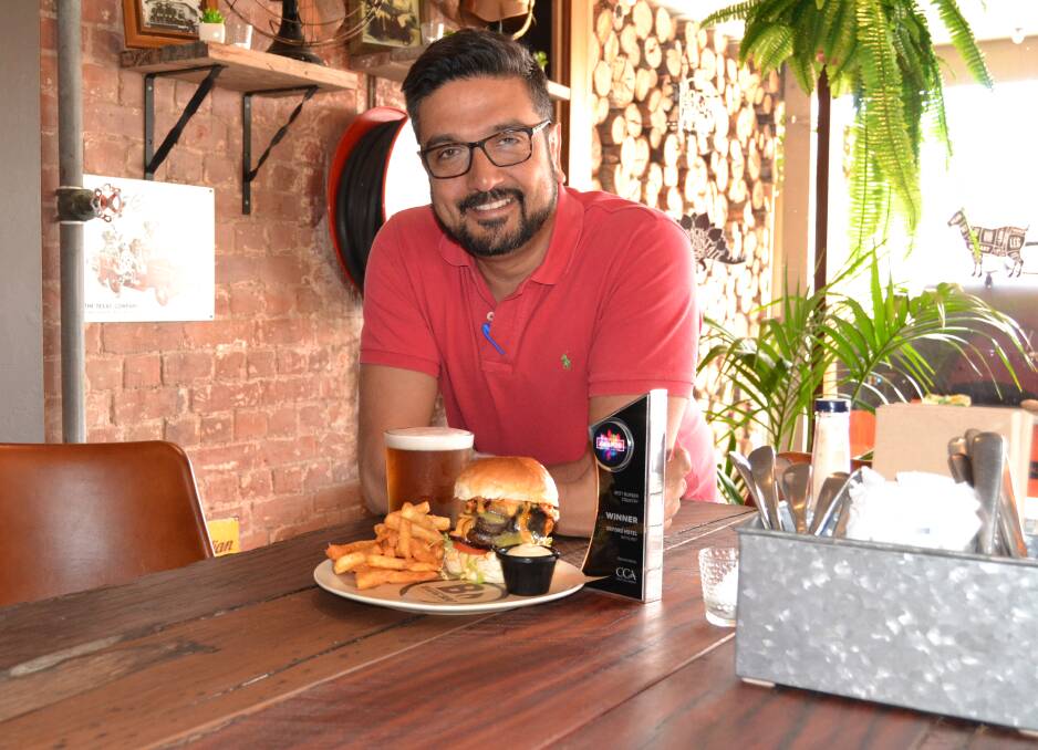 ON THE MENU: The Oxford Hotel's Ash Lyons is pleased the pub has been recognised as the best burger venue among country NSW hotels. 112317oxford2