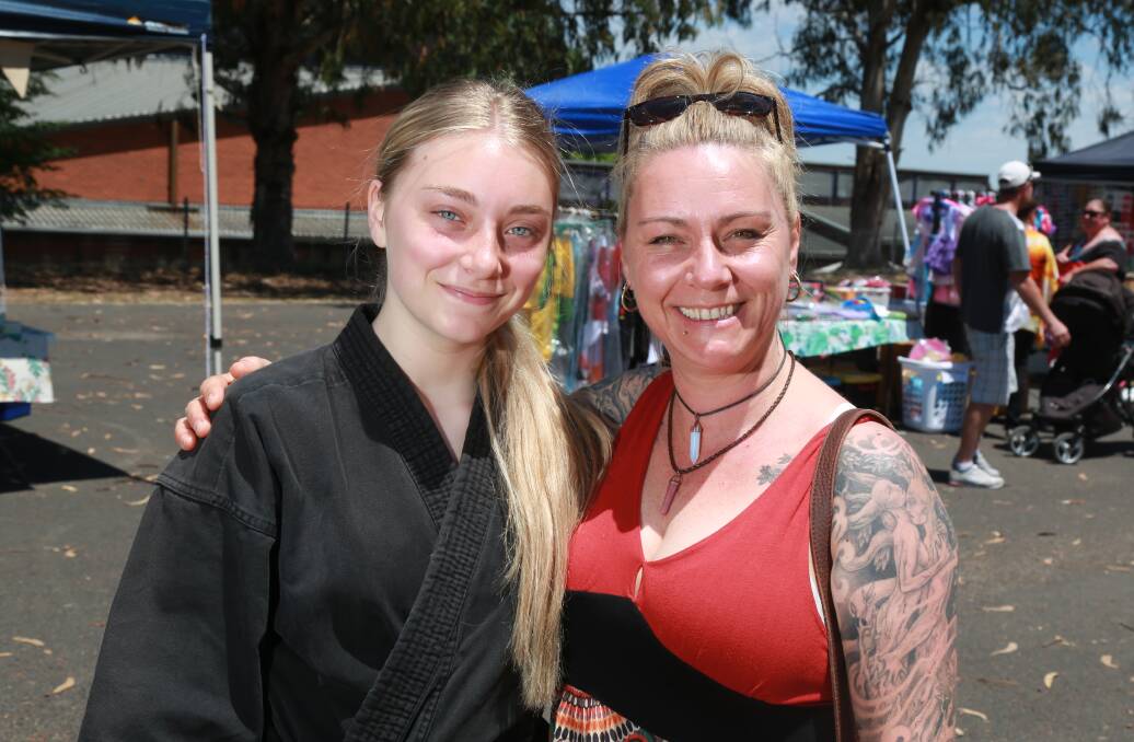 THEY WERE THERE: Neesha Ward and Renae Puckeridge had a look around the fete. 120316pbkelso4