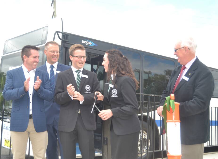 IT'S OFFICIAL: Member for Bathurst Paul Toole, Kelso High principal Mick Sloan, school captains Lachlan Smith and Samantha Pett and deputy mayor Graeme Hanger during the ribbon-cutting for the new Kelso High bus bay. 022717bus2
