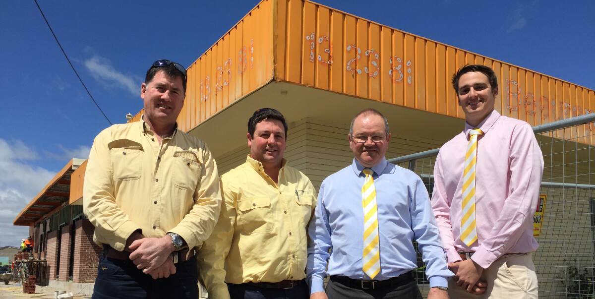 UNDER CONSTRUCTION: Stuart Murphy, Pat Bird, Mark Sullivan and Kurt Waterford of Ray White Emms Mooney outside the building that will be the new home of the business in Bathurst. 100916emms