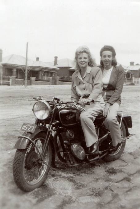 GET OUT ON THE HIGHWAY: Ethel and Gladys Hill out the front of 165 Seymour Street on Gladys’ fiancé’s British-made Velocette motorbike