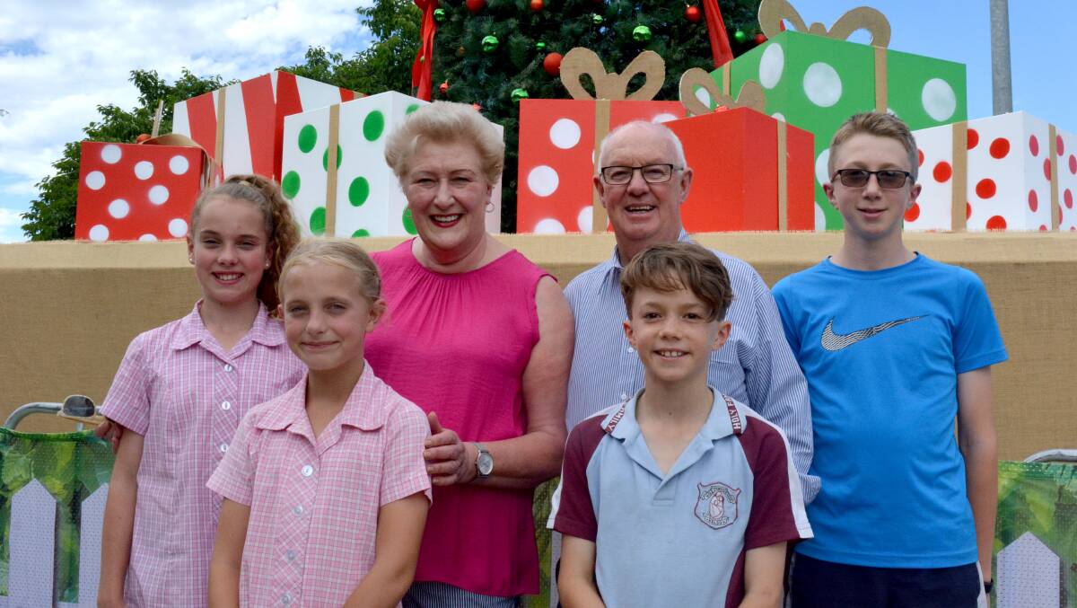 SEASON'S GREETINGS: Mayor Graeme Hanger, his wife Frances and their grandchildren wish readers a merry Christmas.