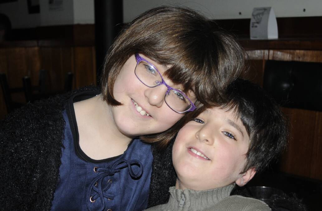SIBLINGS: Bridget, 11, and her brother Ethan Day, 7, were in the crowd. 090416cshave4
