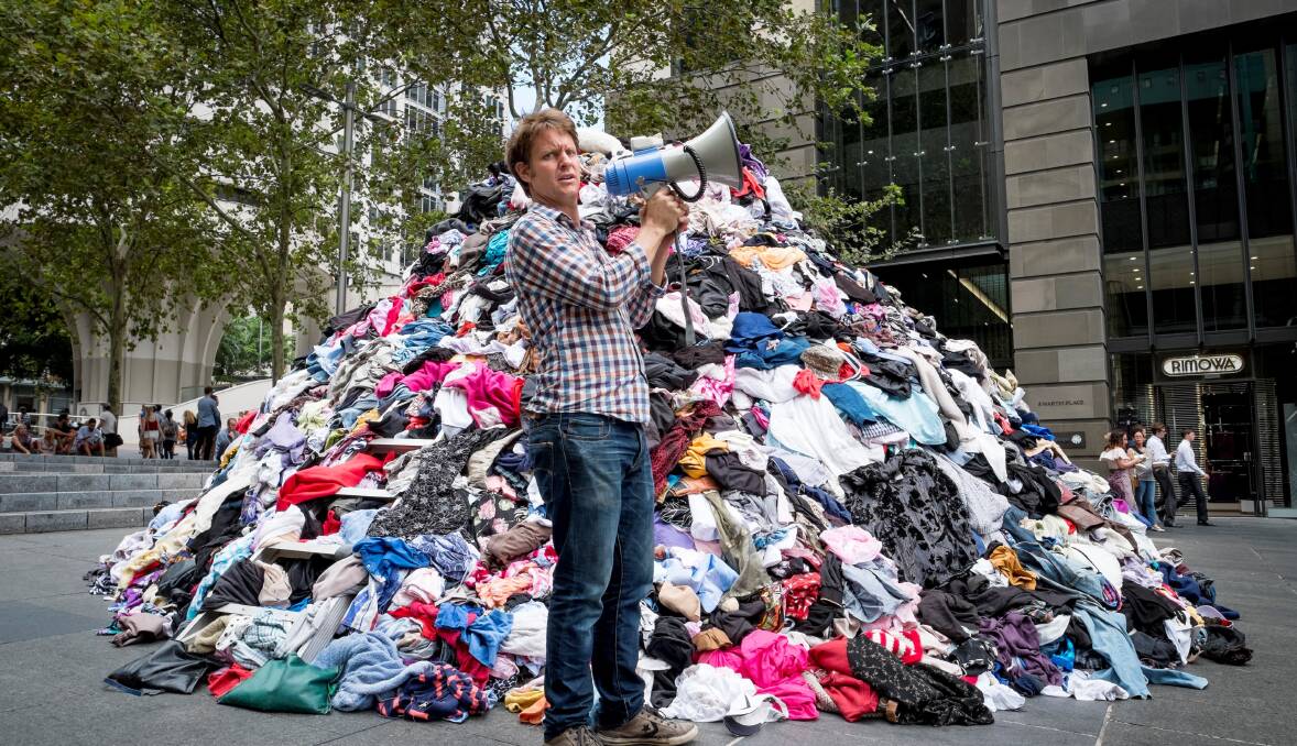 WHAT A LOAD OF RUBBISH: Craig Reucassel with fashion waste in his ABC television series War On Waste.