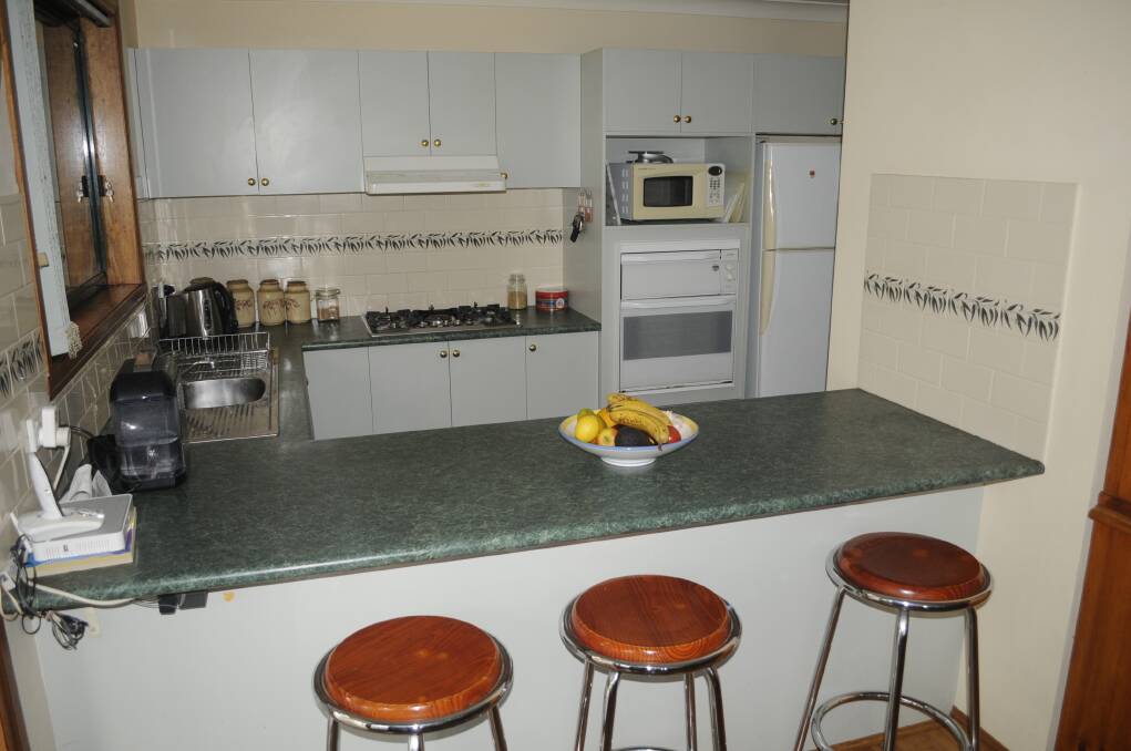ROOM TO MOVE: The kitchen features plenty of bench space and a dishwasher. 022716chome5