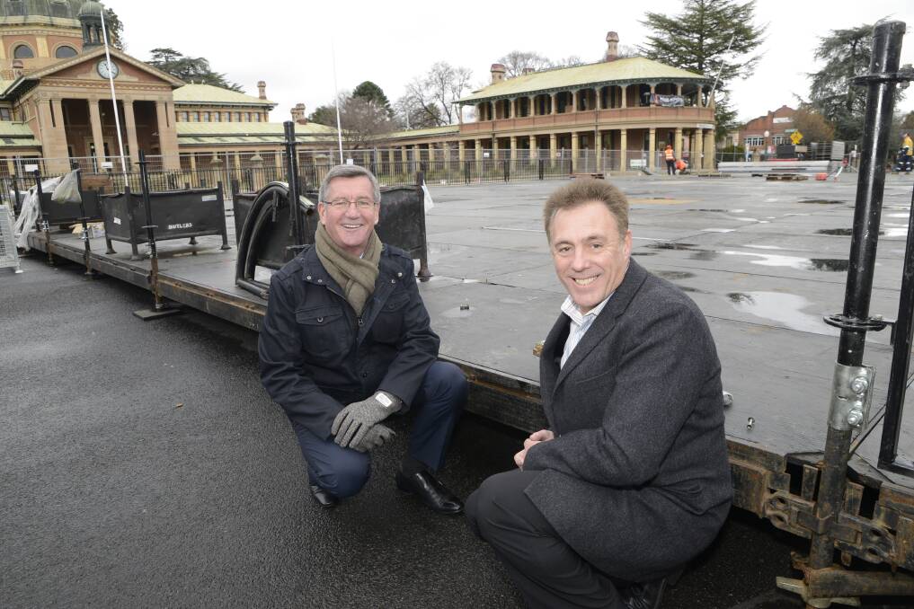 SKATE TIME: Bathurst mayor Gary Rush and McDonald’s licensee Todd Bryant inspect the construction of the city’s ice-skating rink, which will be a highlight of the Bathurst Winter Festival which kicks off on Saturday. Photo: PHILL MURRAY 	062716pice