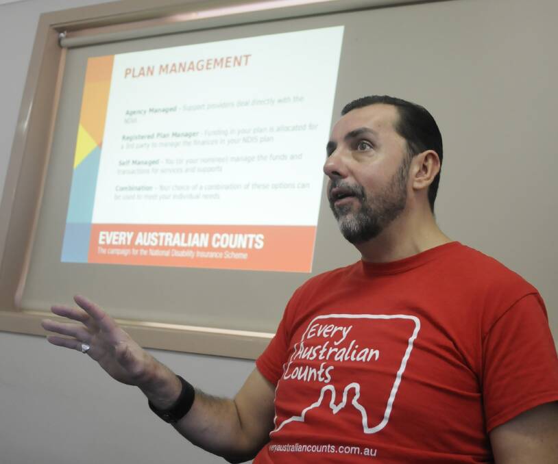 EXPLANATION: Andrew Gibson from Every Australian Counts spoke at Bathurst Seymour Centre about the National Disability Insurance Scheme. Photo: CHRIS SEABROOK 112916cseymor2a