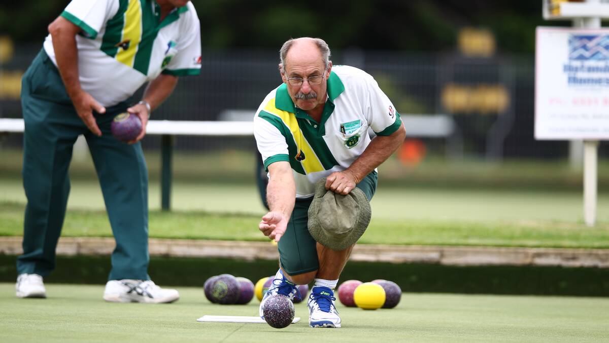 ON THE GREEN: Dereck Huender in action at the Majellan Bowling Club on Saturday. Photo: PHIL BLATCH 032517pbbowls1