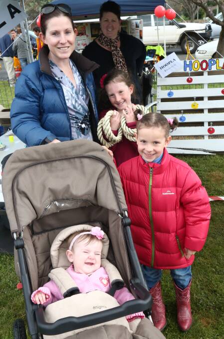 FAMILY: Jess Irvine with Isabella, Mahalia and Willow. Alison Whalan is in the background. Photos: PHIL BLATCH 091016pbfair3