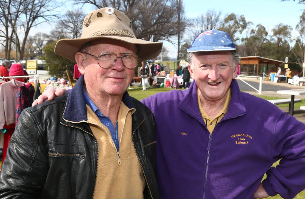 CATCH-UP: Ken Shaw and Rex Gilroy had a yarn at the markets. 080616pblions6