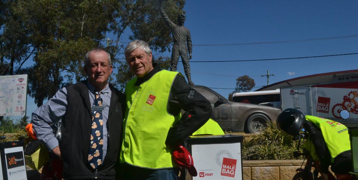 VISIT: Deputy mayor Bobby Bourke and Male Bag Foundation patron and former AFL player and coach David Parkin.