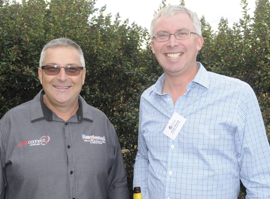 AT THE DEPOT:  Jeff Peak and Angus Edwards attended the evening function. 021517chambr6