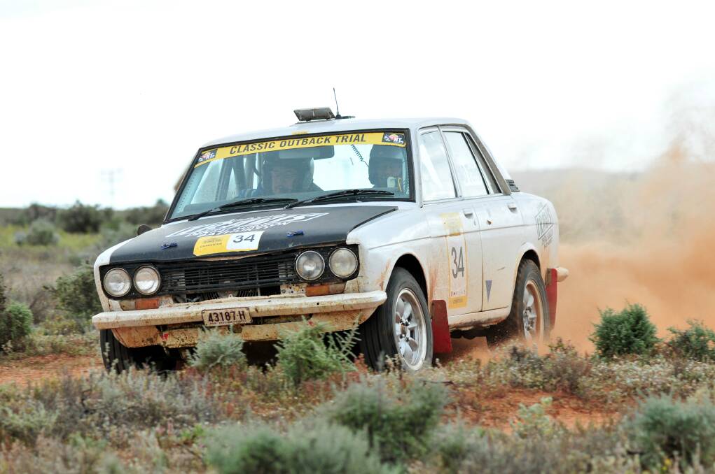 IN FRONT: Bathurst’s Andrew and David Travis, pictured on their way to victory in the 2014 Classic Outback Trial, are on track to defend their crown. Photo: CLASSIC OUTBACK TRIAL 	062316travis