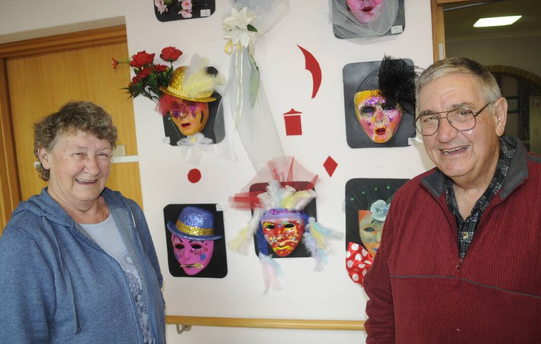 SMILES: June and Robert Cowan had a look around the exhibition of paintings, drawings, prints and craft. 083116cathrn3