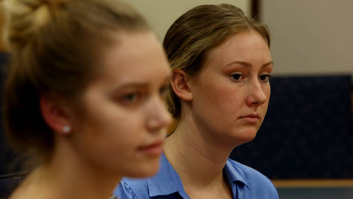 CONCERN: Underpaid worker Lucy Vance, 19 (right), a former Bathurst student. Photo: ROBERT PEET