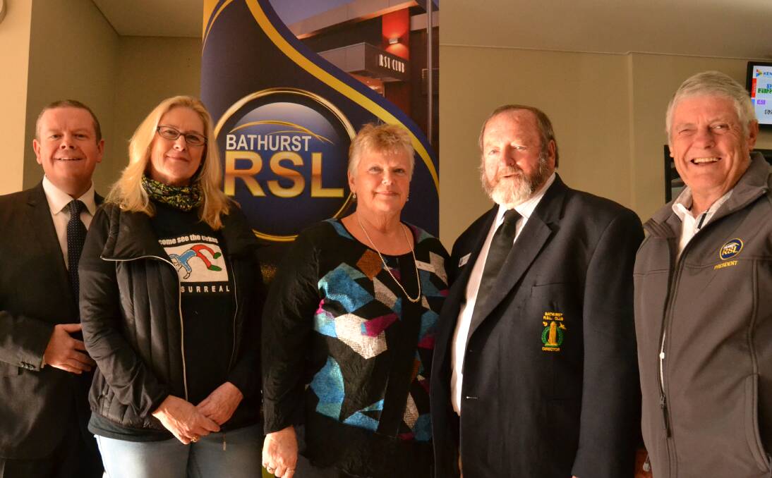 HONOUR: Bathurst RSL Club general manager Peter Sargent, Stephanie Brown of Cirkus Surreal, Wendy-lou Tisdell of Evans Arts Council, Ron Hollebone and Bathurst RSL Club president Ian Miller.