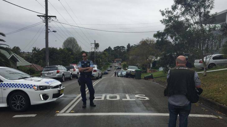 Police on the scene at Mountain Avenue in Woonona. Photo: Kate McIlwain