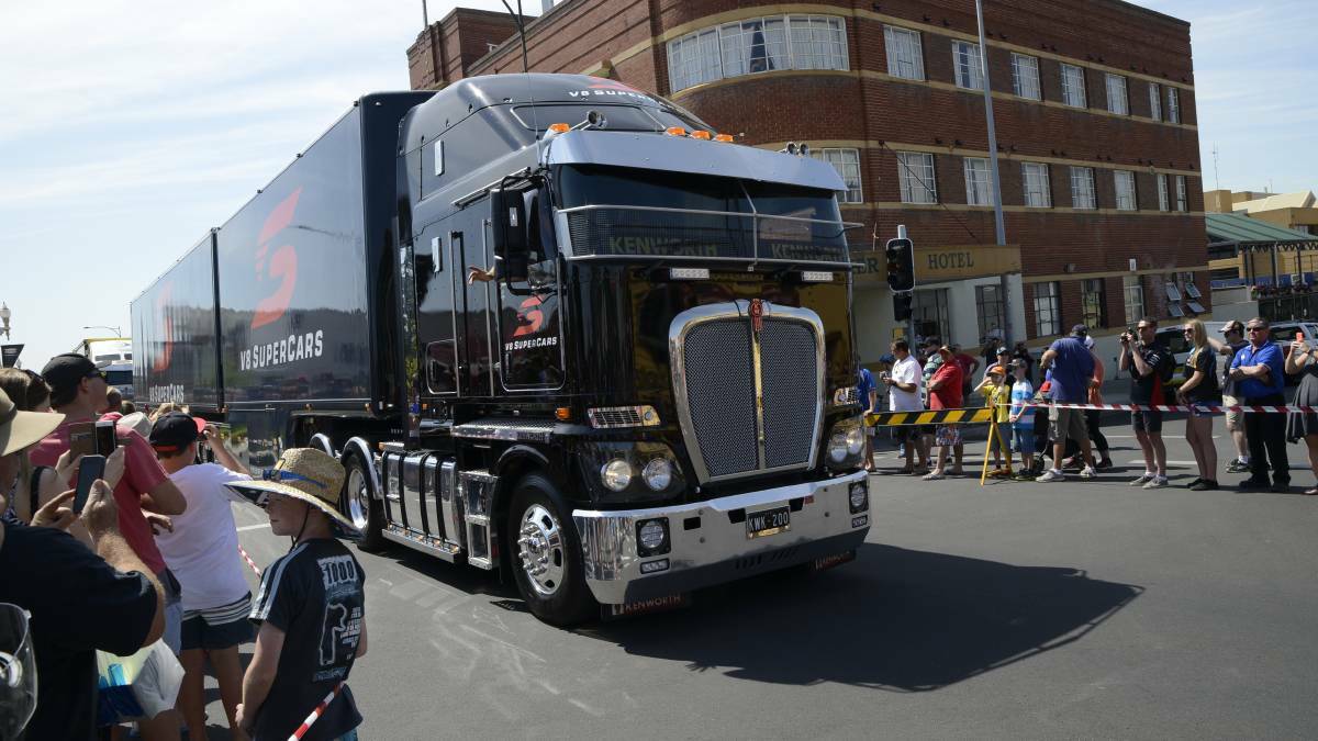 The Supercar Transporter Parade can be watched from the street as the trucks and drivers make their way up William Street to Kings Parade. Photo: PHIL MURRAY 
Click the image to see more photos from 2015. 