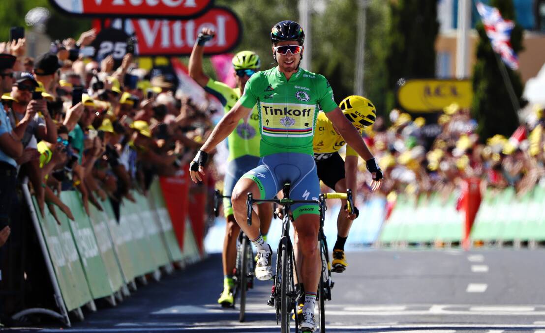 Peter Sagan of Slovakia riding for Tinkoff in the green sprinters jersey takes the stage win from Chris Froome of Great Britain riding for Team Sky in the yellow leaders jersey during stage eleven of the 2016 Le Tour de France, a 162.5 km stage from Carcassone to Montpellier on July 13, 2016 in Montpellier, France. (Photo by Michael Steele/Getty Images)