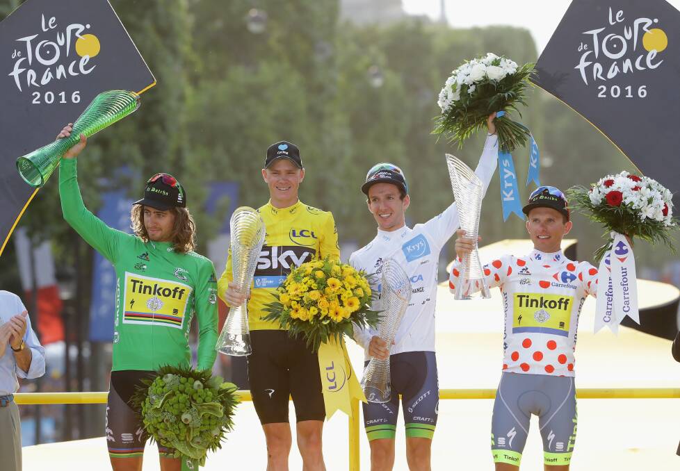 (L-R) Peter Sagan of Slovakia and Tinkoff, Chris Froome of Great Britain and Team Sky, Adam Yates of Great Britain and Orica Greenedge and Rafal Majka of Poland and Tinkoff celebrate on the podium following stage twenty one of the 2016 Le Tour de France, from Chantilly to Paris Champs-Elysees on July 24, 2016 in Paris, France. (Photo by Chris Graythen/Getty Images)