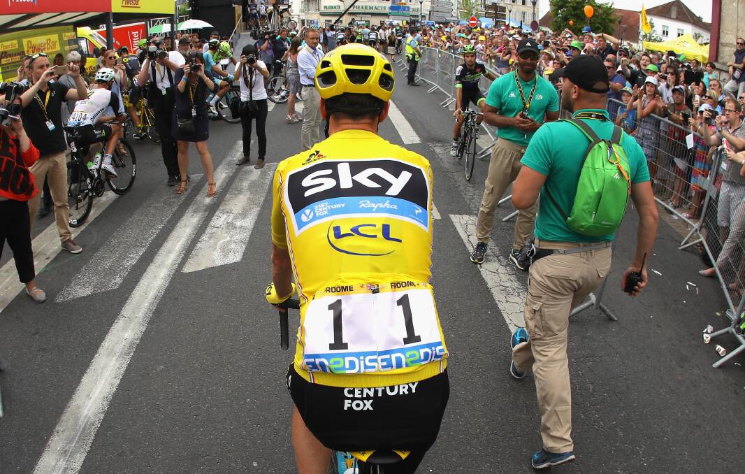 Chris Froome of Great Britain and Team Sky fashions the Yellow Jersey during stage twenty one of the 2016 Le Tour de France, from Chantilly to Paris Champs-Elysees on July 24, 2016 in Paris, France. (Photo by Chris Graythen/Getty Images)