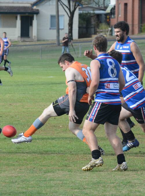 GIANT KILLERS: Adam Dredge-Critchley and his Bathurst Giants team-mates were out to upset Orange on Saturday in Central West AFL but won't get the chance after play was called off. Photo: PHILL MURRAY 043016pafl3