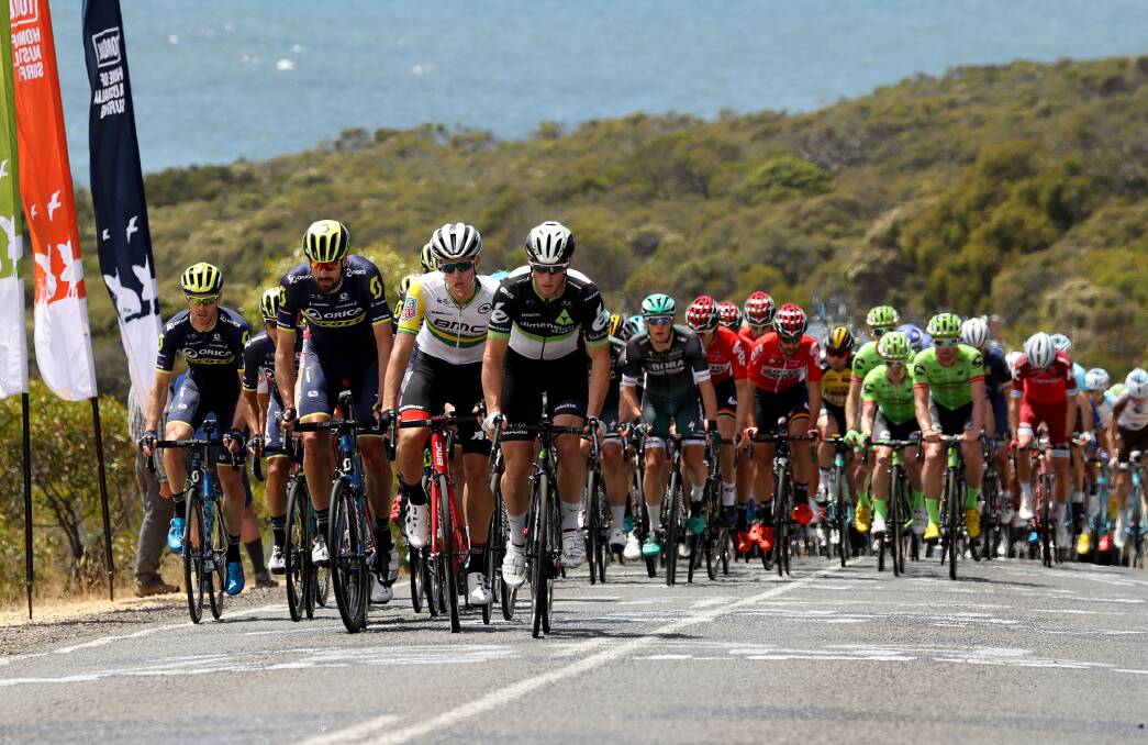 CLIMBING: Mark Renshaw (right) leads the way up the Bells Beach climb during the Cadel Evans Great Ocean Road Race at Geelong. Photo: GETTY IMAGES