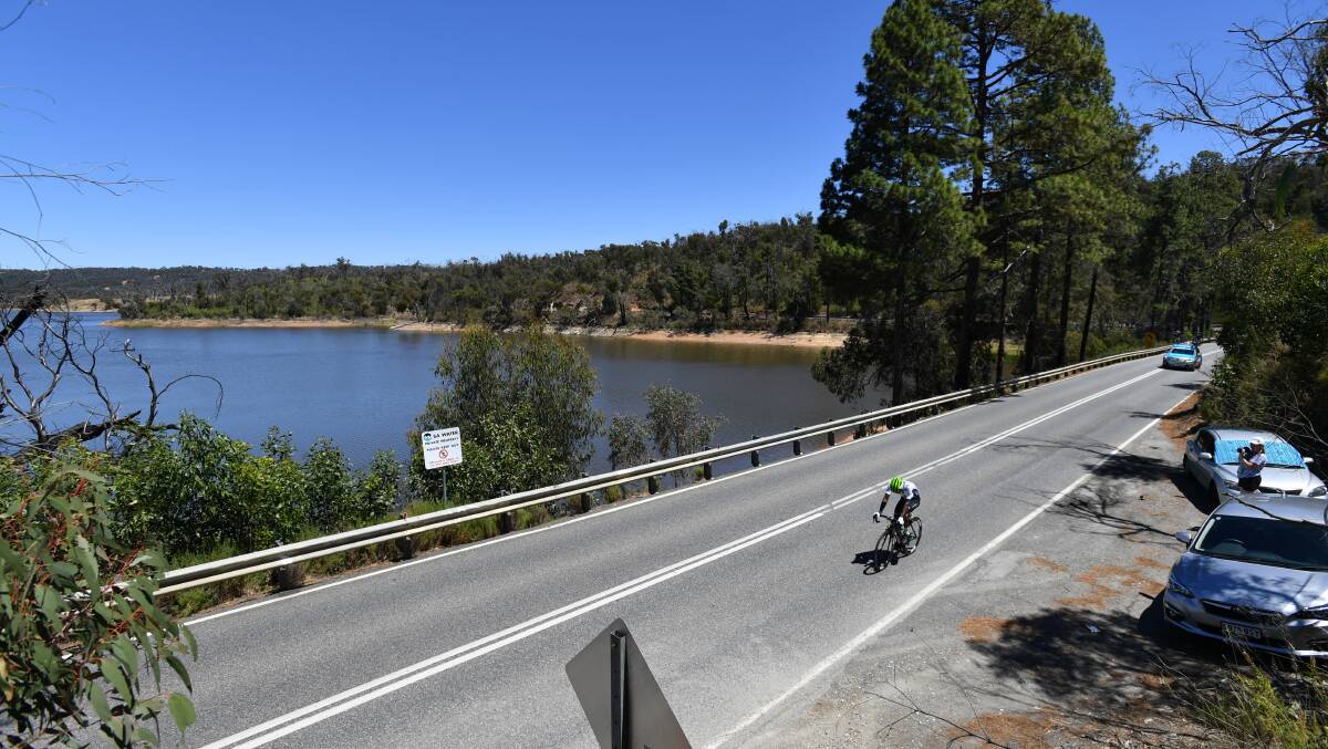 MOUNTAIN MAN: Mark Renshaw's Dimension Data team-mate Nicholas Dlamini rides solo during stage two of the Tour Down Under from Unley to Stirling in the Adelaide Hills. Photo: AAP