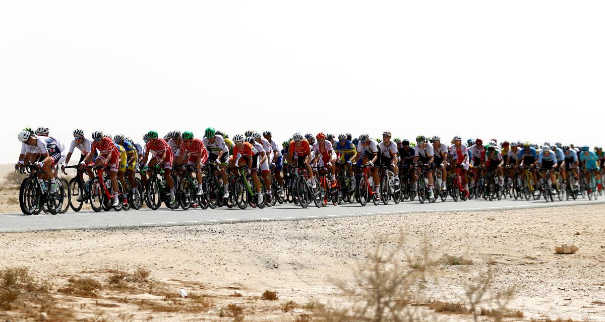 SAND MAN: Mark Renshaw's elite men's road race in Doha came to an end after a puncture as he made his way through the desert. Photo: GETTY IMAGES
