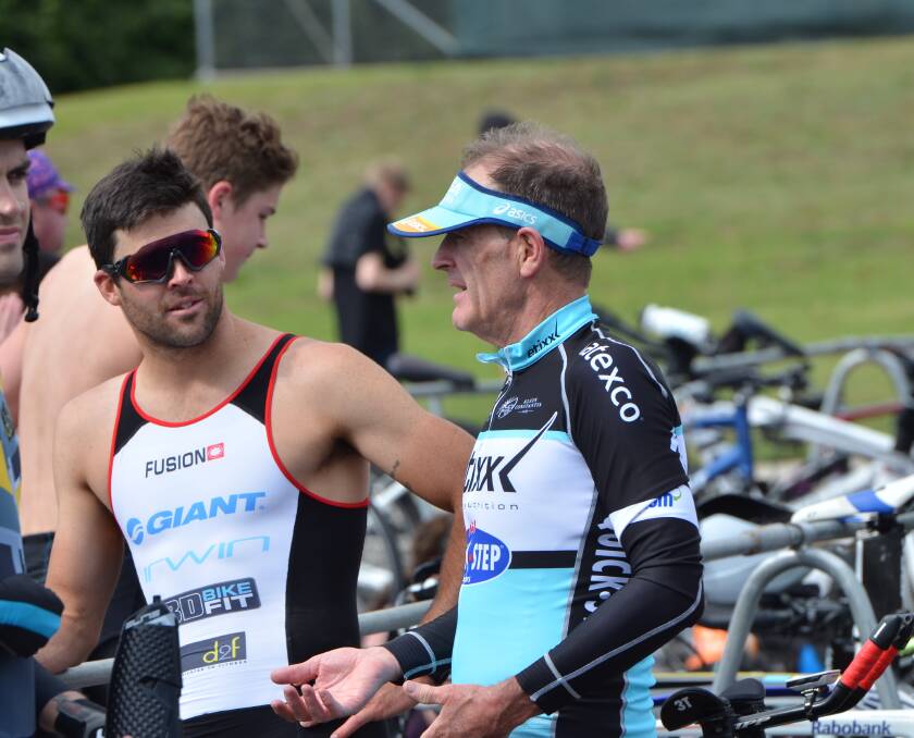 TALKING TRI: Nick North and Mark Windsor chat after a Bathurst Wallabies club race this season. This Sunday members of the Bathurst club will race in Forbes.