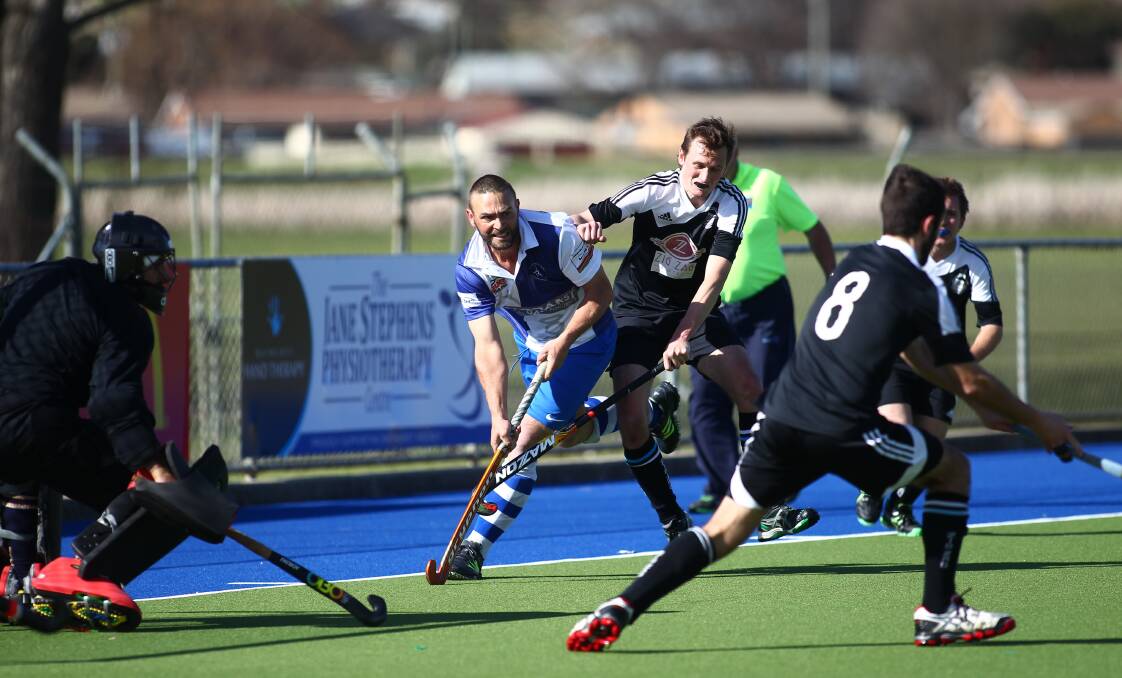 DOUBLE VISION: Brent Naylor scored two goals in the first half as he and his Saints took on Lithgow Zig Zag. Photo: PHIL BLATCH 081316pbpats1