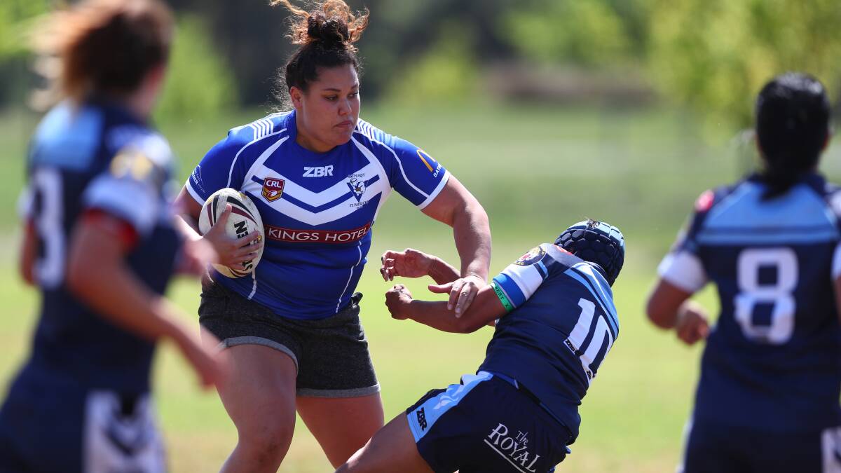 Western Region Women's Tackle Nines action captured by Phil Blatch.