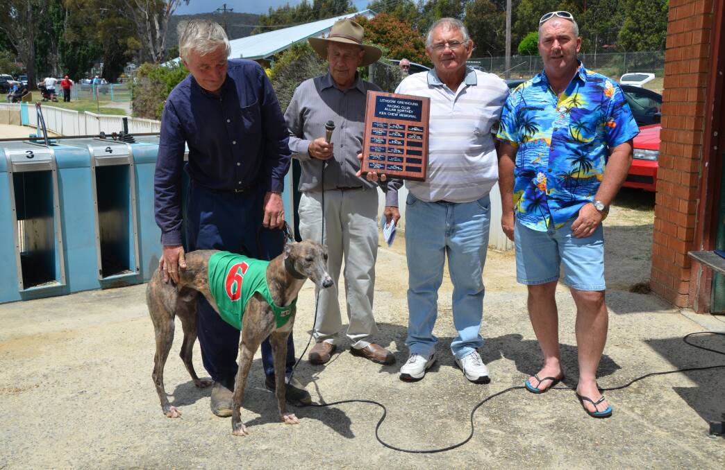 K CHEW A NORTHEY SPRINT FINAL WINNER: Trainer Richard Board with Easy Breeze, Lithgow greyhounds president John Brain, Terry Northey and Brian Bonus.