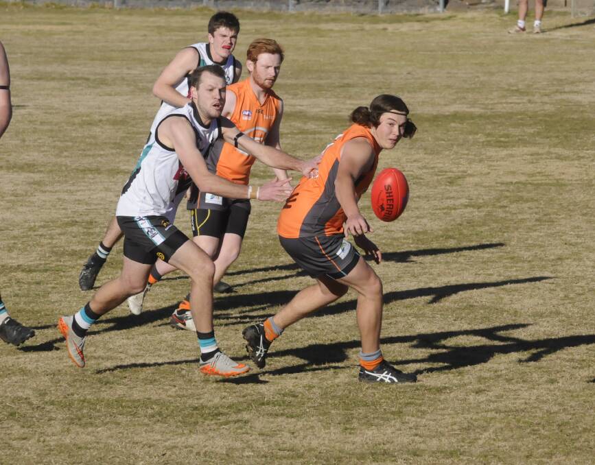 WORKING HARD: Bathurst Giant Lachlan Weal in action against the Bushrangers Rebels in Saturday's local derby. Photo: CHRIS SEABROOK 072217cafl1