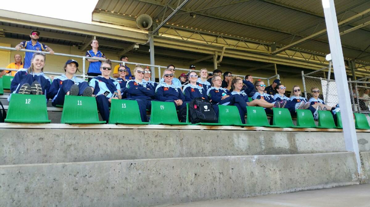 TAKING IT IN: Bec Cady (third from left) watches some of the Australian Country Championships action with her team-mates. Photo: COUNTRY CRICKET NSW FACEBOOK