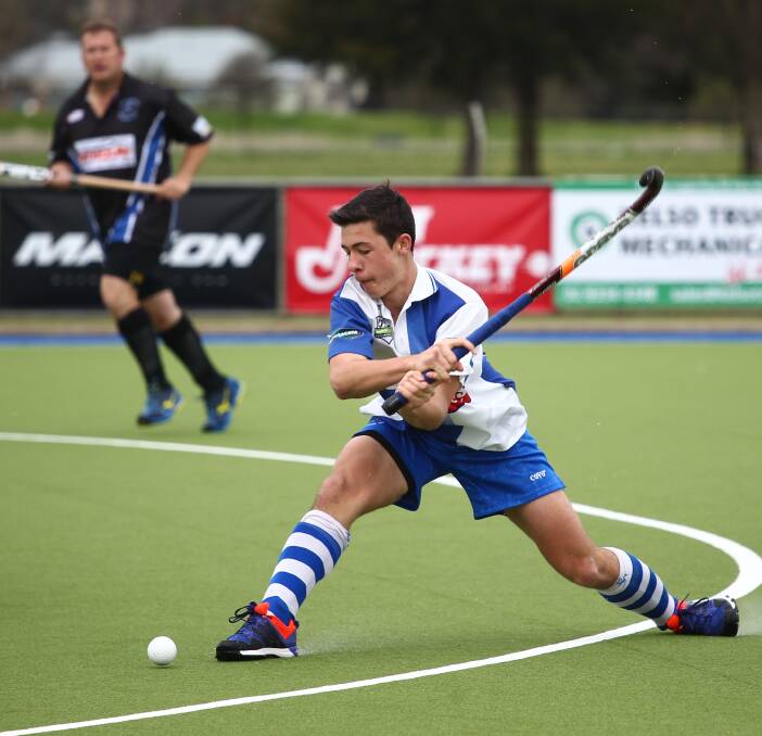 STRIKE POWER: Tyler Willott scored a double for St Pat's White in Saturday's grand final.  White won the match 6-2 against St Pat's Blue. Photo: PHIL BLATCH