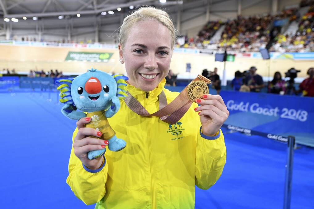 THAT'S GOLD: Kaarle McCulloch with one of her gold medals. Photo: AAP