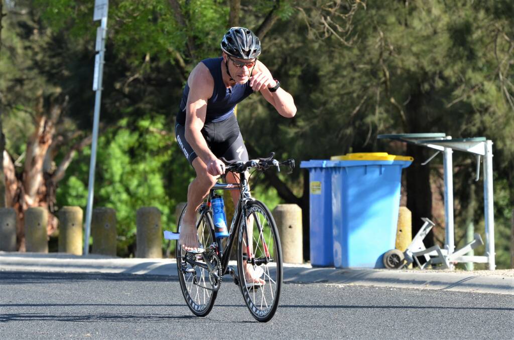 CATCH UP: Dennis Martin made up three places during the 20km cycle leg in Sunday's Jackie Fairweather Memorial Triathlon. Photo: ANYA WHITELAW