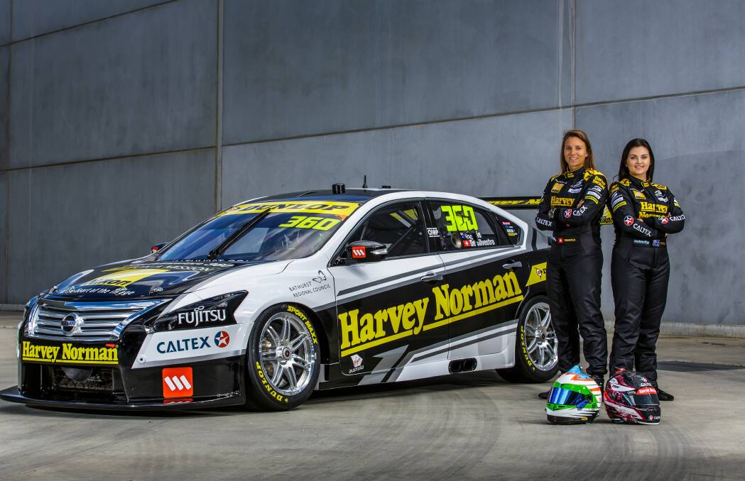 NEW LOOK: Simona De Silvestro and Renee Gracie pose with the Nissan they will steer in this year's Bathurst 1000. Photo: MARK WALKER
