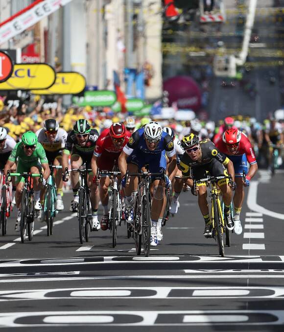SO CLOSE: Marcel Kittel (left) manages to hold out Bryan Coquard to claim stage four of the Tour de France. Mark Cavendish (far left) lost the green jersey after finishing eighth. Photo: GETTY IMAGES 070616tour
