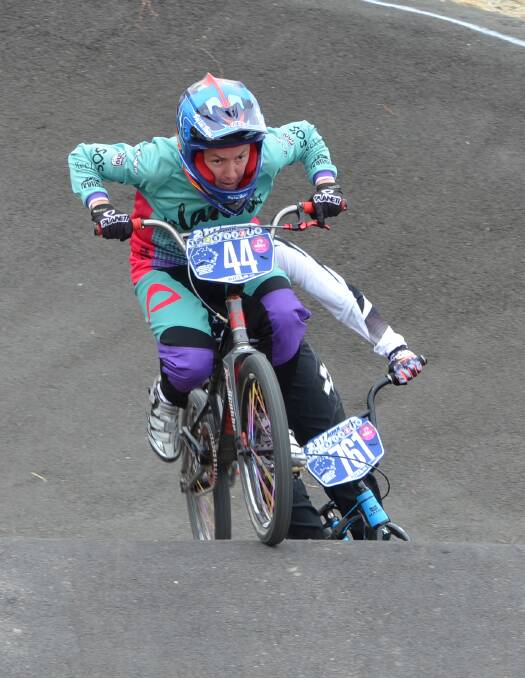 GOOD START: Bathurst BMX Club's Hayley Wolfenden leads the way over Kiwi rival Toni James in a moto during the Oceania Championships. Photo: ANYA WHITELAW