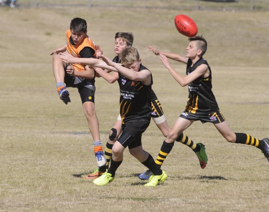 YOUNG TALENT TIME: Cooper Brien and his fellow under 14 Bathurst Giants won another Central West AFL premiership for the club on Sunday.