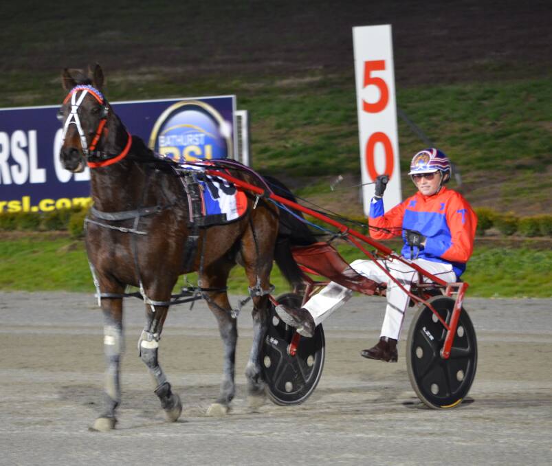 HAPPY WINNER: The Lagoon trainer-driver Nathan Turnbull was delighted to pick up a win with His A Tease at the Bathurst Paceway on Wednesday night. Photo: ANYA WHITELAW 080416yturnbull2