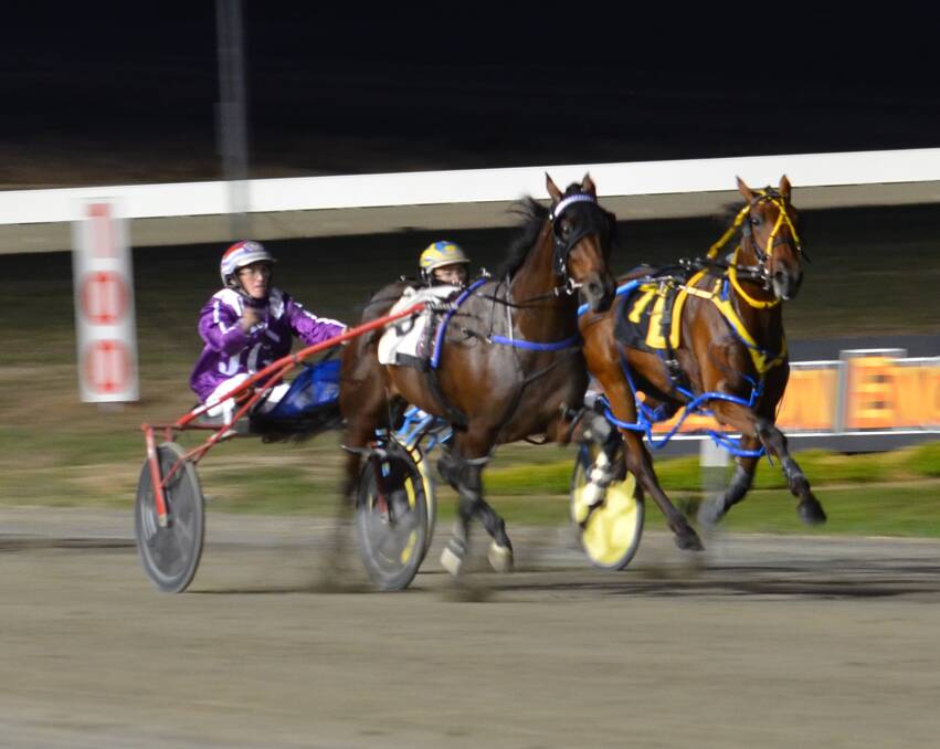 COMING THROUGH: Amanda Turnbull charges into the lead with her filly Now Eye See  in the second Gold Tiara heat. Photo: ANYA WHITELAW